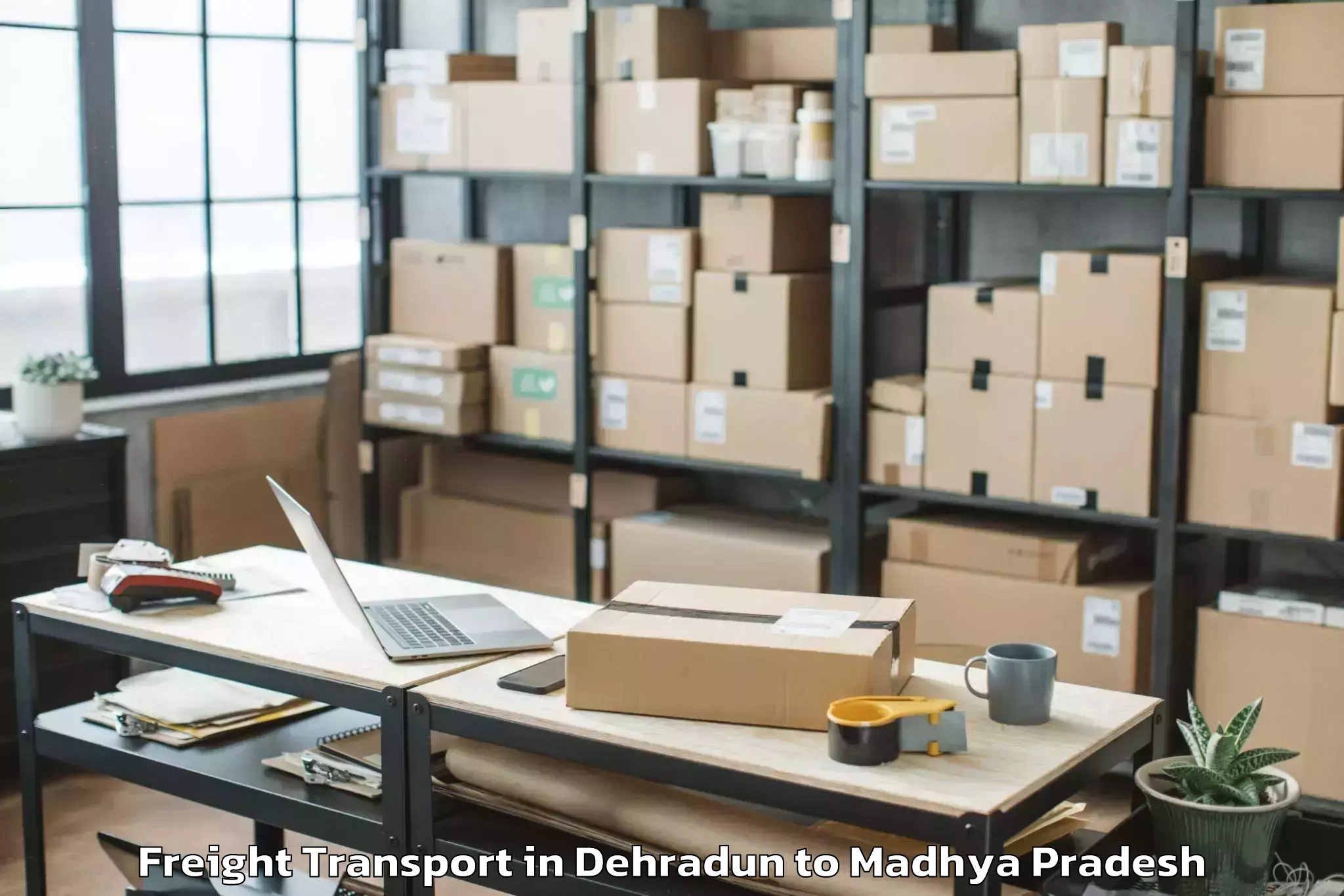 Book Dehradun to Karera Freight Transport Online